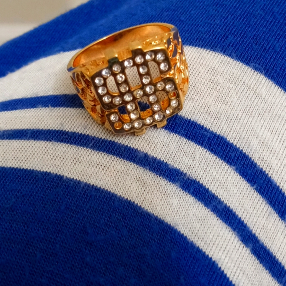 Man $sign ring